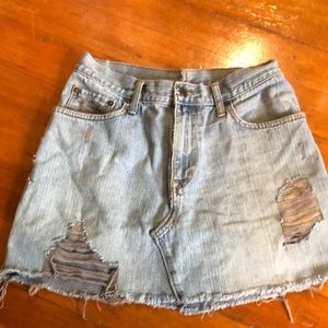 Upcycled distressed denim skirt